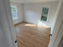 glens-falls-interior-painting-white-bedroom-with-hardwood-floor